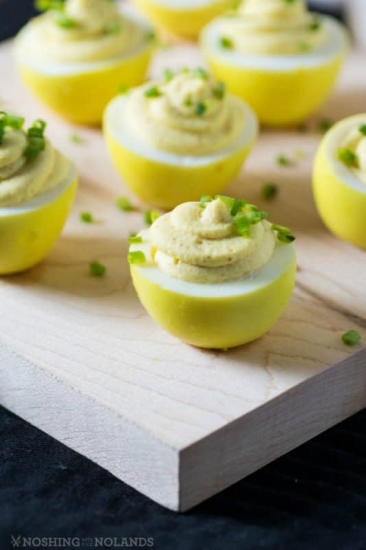 <p>Noshing With The Nolands</p><p>These turmeric-dyed curry deviled eggs are a delight not only for the taste buds but visually so appealing for spring. They are as easy as any other deviled egg is to make.</p><p><strong>Get the recipe: <a href="https://noshingwiththenolands.com/turmeric-dyed-curry-deviled-eggs/" rel="nofollow noopener" target="_blank" data-ylk="slk:Turmeric Dyed Curry Deviled Eggs;elm:context_link;itc:0;sec:content-canvas" class="link rapid-noclick-resp">Turmeric Dyed Curry Deviled Eggs</a></strong></p>