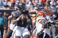 Chicago Bears quarterback Justin Fields looks to pass during the first half of an NFL football game against the Cincinnati Bengals Sunday, Sept. 19, 2021, in Chicago. (AP Photo/David Banks)