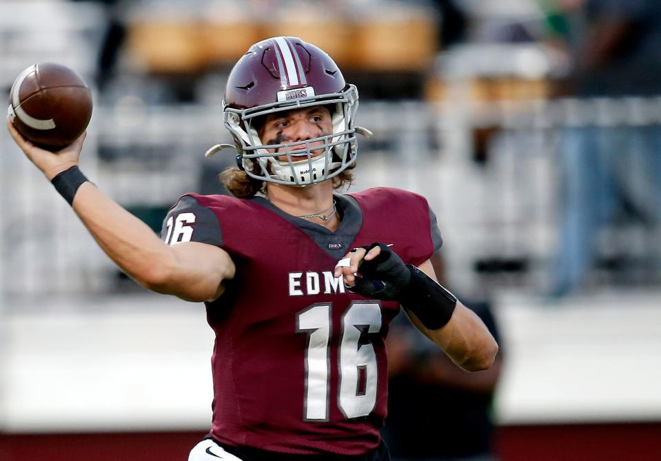 Edmond Memorial's David McComb throws a pass during the high school football game between Edmond Memorial and Edmond Santa Fe at Edmond Memorial High School in Edmond, Okla., Friday, Sept., 23, 2022. 