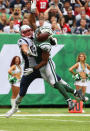 <p>Tight end Rob Gronkowski #87 of the New England Patriots attempts to make a catch around inside linebacker Darron Lee #58 of the New York Jets during the second quarter of their game at MetLife Stadium on October 15, 2017 in East Rutherford, New Jersey. (Photo by Al Bello/Getty Images) </p>