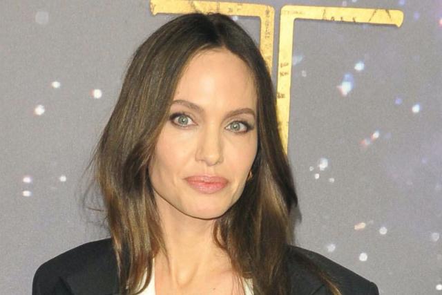 Angelina Jolie Wears Nude Louboutin Pumps with Vivienne Jolie-Pitt