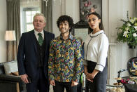This image released by Netflix shows Cameron Rhodes, from left, Mena Massoud and Sonia Gray in a scene from "The Royal Treatment." (Kirsty Griffin/Netflix via AP)