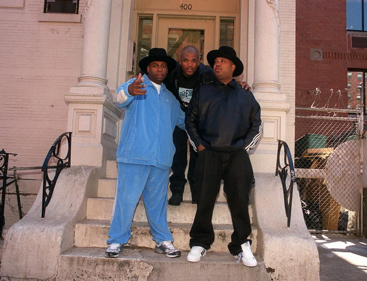 Rap trio Run DMC sport hip hop style in 2001.