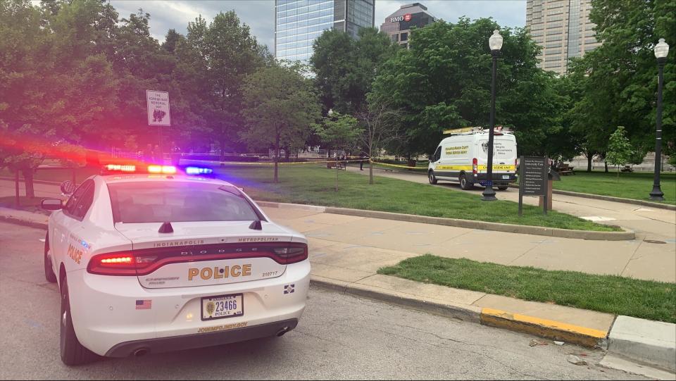An Indianapolis Metropolitan Police vehicle is parked near the intersection of N. Meridian Street and Vermont Street where officials are investigating a fatal stabbing May 19, 2022.