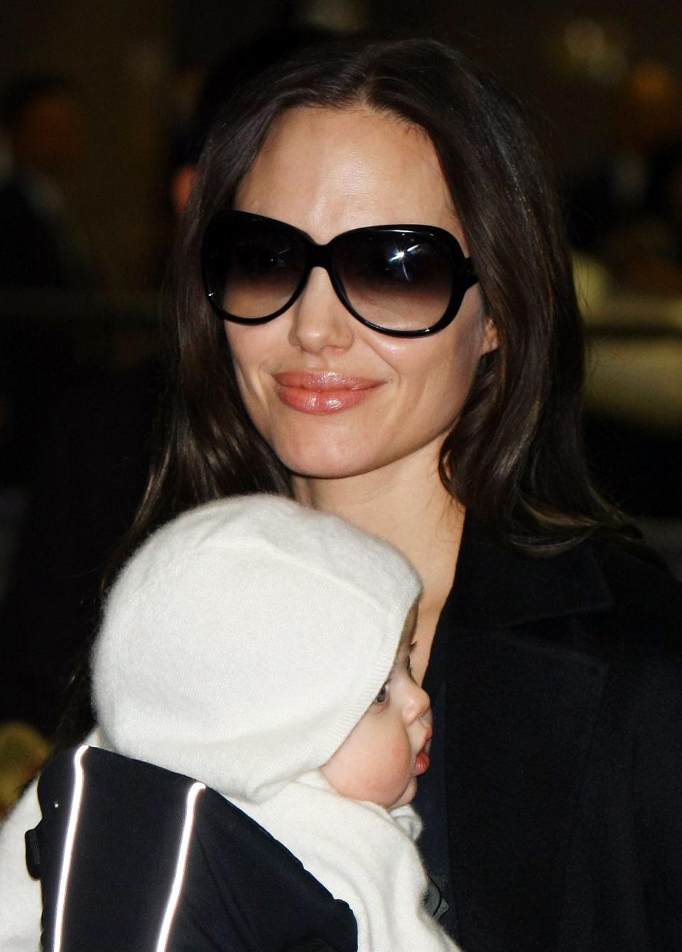 Angelina Jolie arrives at Narita International Airport with her baby, Vivienne, on January 27, 2009 in Narita, Chiba, Japan (Getty Images)