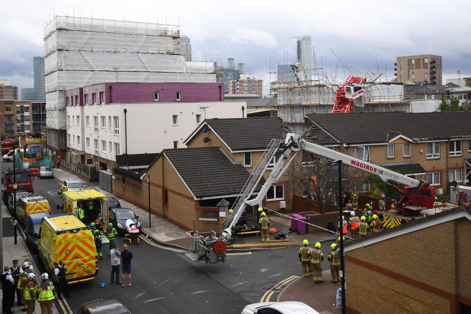 The scene in Bow, east London, where a 20-metre crane has collapsed on to a house leaving people trapped inside.