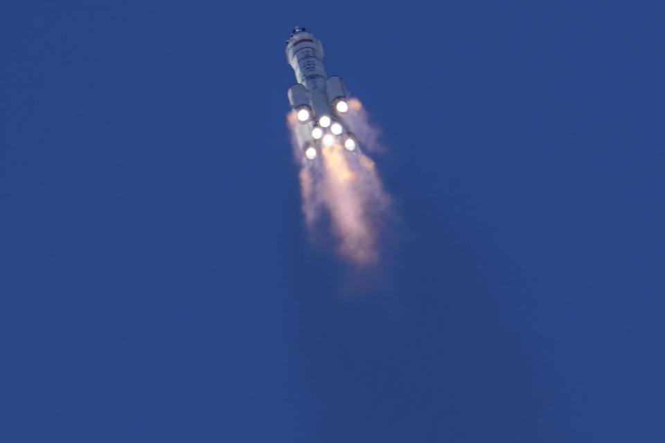 A Long March-2F Y12 rocket carrying a crew of Chinese astronauts in a Shenzhou-12 spaceship lifts off at the Jiuquan Satellite Launch Center in Jiuquan in northwestern China, Thursday, June 17, 2021. China has launched the first three-man crew to its new space station in its the ambitious programs first crewed mission in five years. (AP Photo/Ng Han Guan)