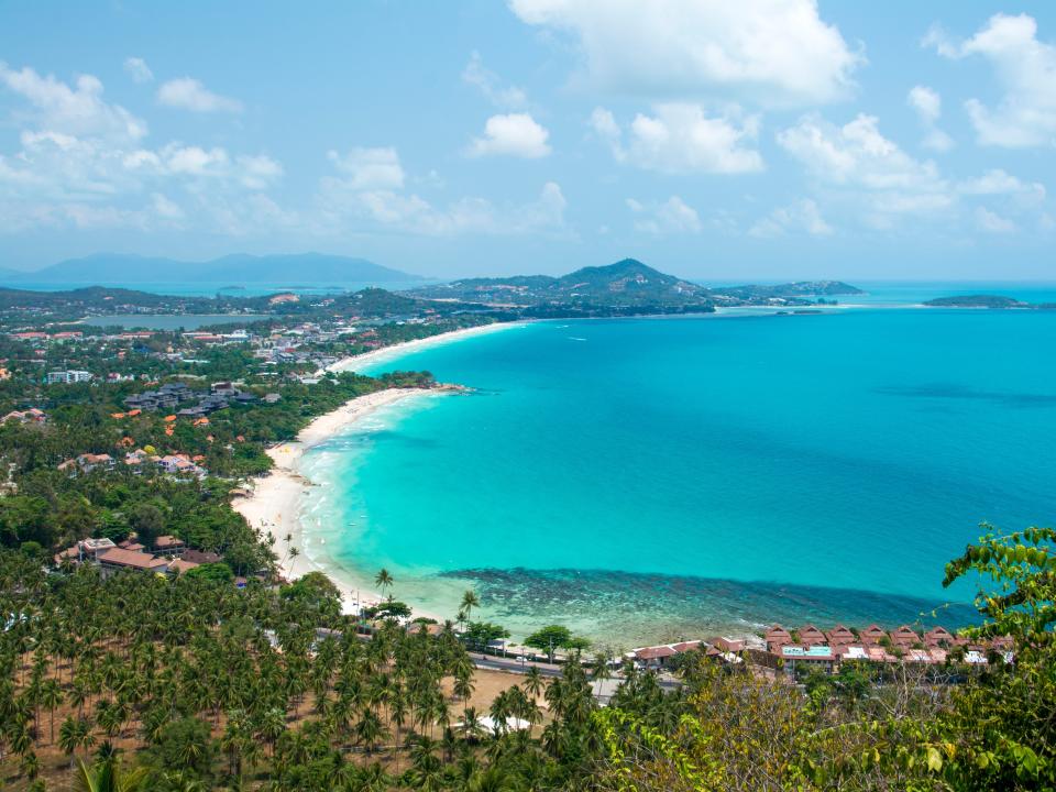 Aerial view of Chaweng Beach in Koh Samui, Thailand, "luxury hotels around the world that start at $150 a night"