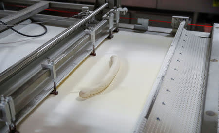 Dough moves along the production line at the Gonnella Baking Company in Aurora, Illinois, U.S., November 16, 2017. Picture taken November 16, 2017. REUTERS/Kamil Krzaczynski