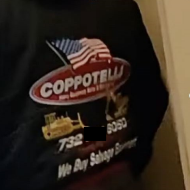 Jacket worn by suspect Robert Coppotelli inside the U.S. Capitol building on Jan. 6, 2021 (phone number partially redacted).