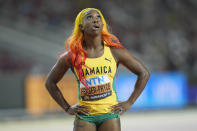 Shelly-Ann Fraser-Pryce, of Jamaica, reacts after she won her women's 100 meter semifinal heat during the World Athletics Championships in Budapest, Hungary, Monday, Aug. 21, 2023. (AP Photo/Ashley Landis)