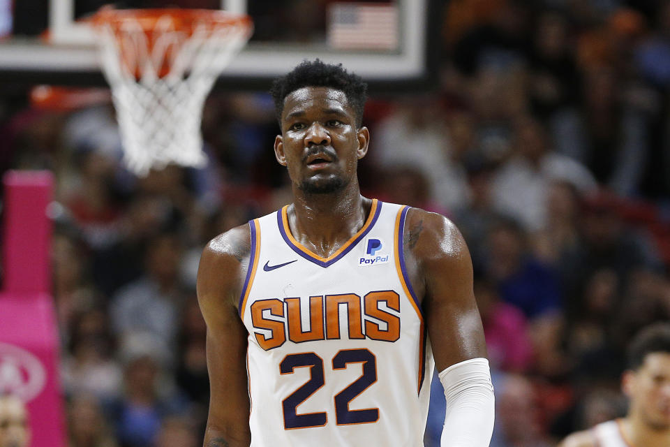 The NBA has suspended Phoenix Suns center Deandre Ayton for 25 games. (Michael Reaves/Getty Images)
