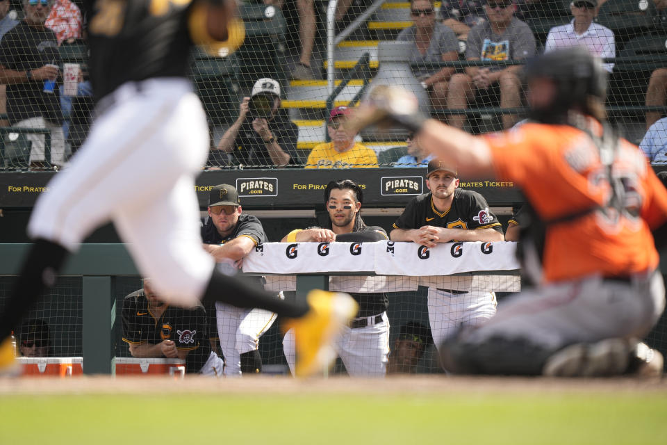 Pittsburgh Pirates left fielder Connor Joe (2) watches from the dugout during a spring training baseball game against the Baltimore Orioles Tuesday, Feb. 28, 2023, in Bradenton, Fla. (AP Photo/Brynn Anderson)