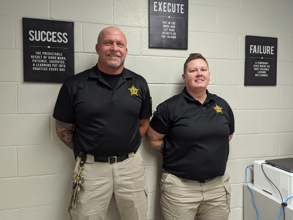 Capt. Mark Green, administrator for the Ottawa County Detention Facility, left, stands with Tabby Mowel, the new facility mental health coordinator.