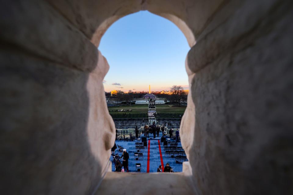 Final preparations are made ahead of President-elect Joe Biden's inauguration ceremony, Jan. 20, 2021, in Washington.