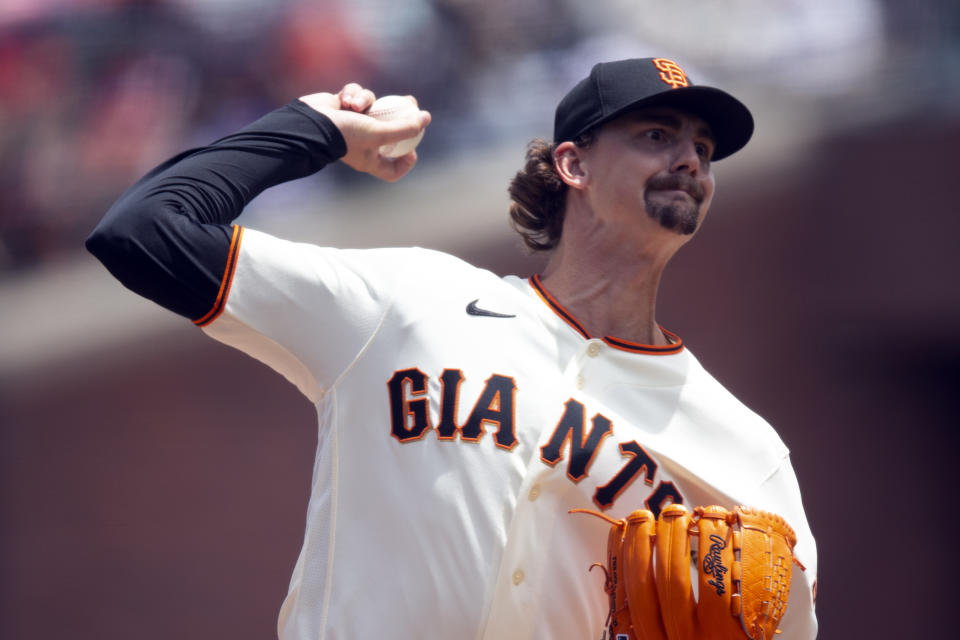 San Francisco Giants pitcher Sean Hjelle delivers against the Chicago White Sox during the third inning of a baseball game, Sunday, July 3, 2022, in San Francisco. (AP Photo/D. Ross Cameron)