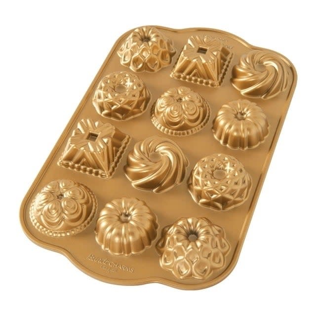 Baking tray with various intricate molds for pastries or cakes