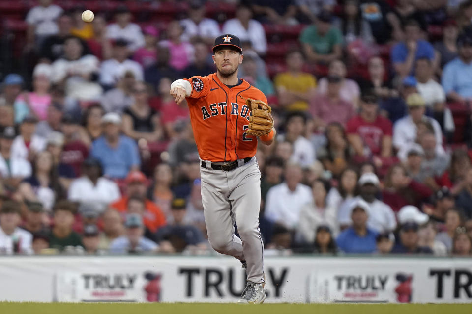 Houston Astros third baseman Alex Bregman throws to first to retire Boston Red Sox's Luis Urias during the ninth inning of a baseball game Wednesday, Aug. 30, 2023, in Boston. (AP Photo/Steven Senne)