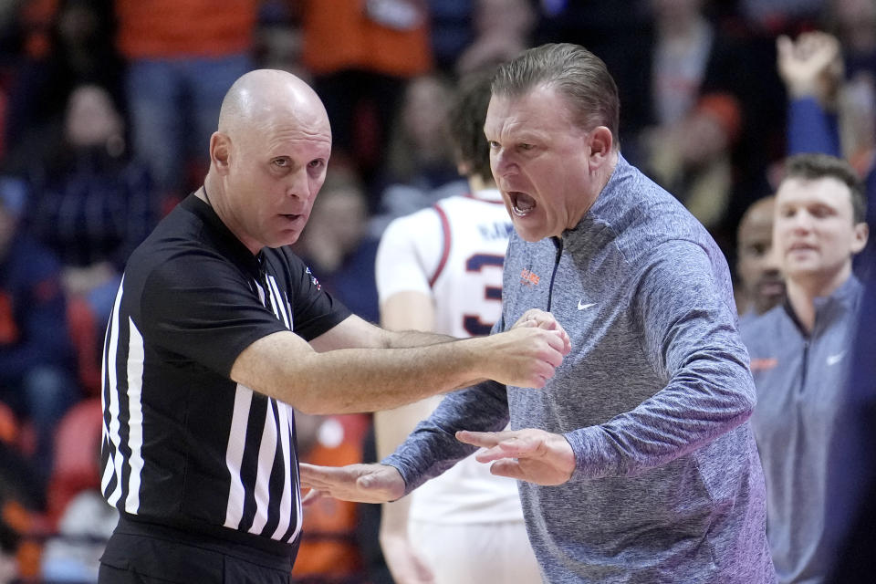Illinois head coach Brad Underwood yells at a referee during the second half of an NCAA college basketball game against Maryland Sunday, Jan. 14, 2024, in Champaign, Ill. Maryland upset Illinois 76-67. (AP Photo/Charles Rex Arbogast)