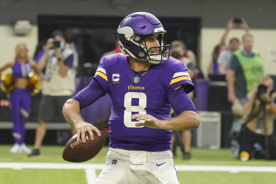 Minnesota Vikings quarterback Kirk Cousins has thrown eight TDs with zero interceptions this season. (AP Photo/Jim Mone)