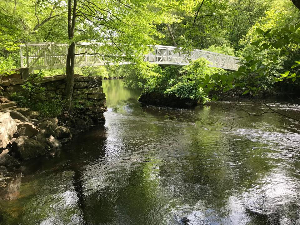 The 75-foot Polly Coon Bridge, built across the Pawcatuck River, connects the Grills Wildlife Sanctuary in Hopkinton and the Grills Preserve in Westerly.