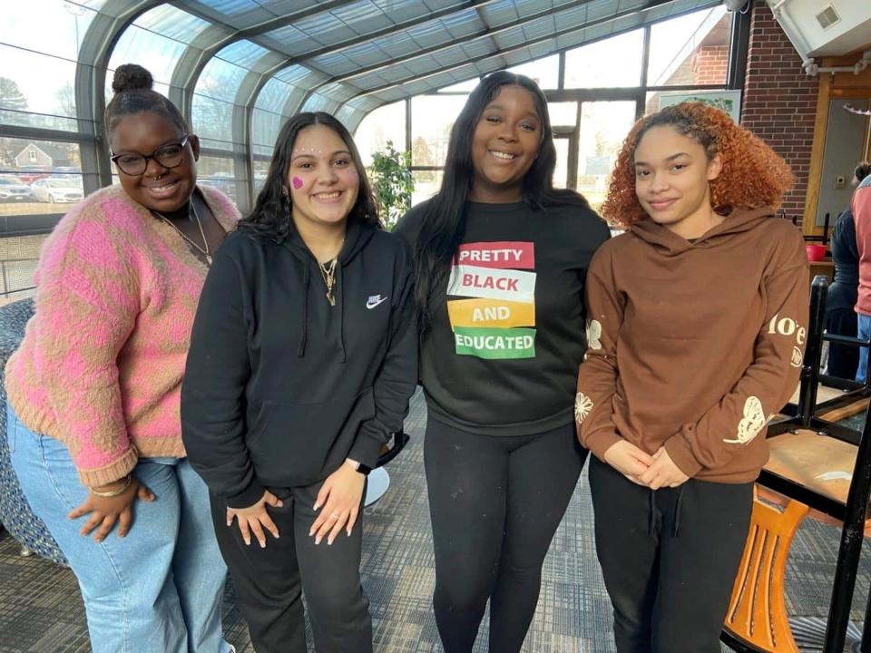 From left, Southeastern Regional Vocational Technical High School students Trinity Stinson Salmon, Syleena Marrero, Abby Mathieu and Khalia Darosa. The students helped patients evacuate during the Feb. 7, 2023 fire at Brockton Hospital, where they were working as interns.