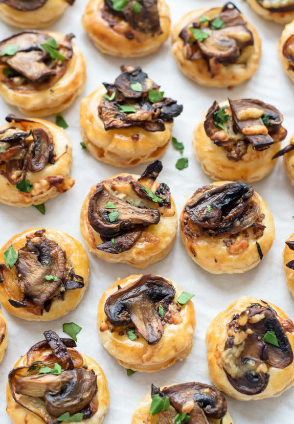 <strong>Get the <a href="http://www.wellplated.com/mushroom-puff-pastry/">Cheesy Mushroom Puff Pastry Bites recipe</a>&nbsp;from Well Plated By Erin</strong>