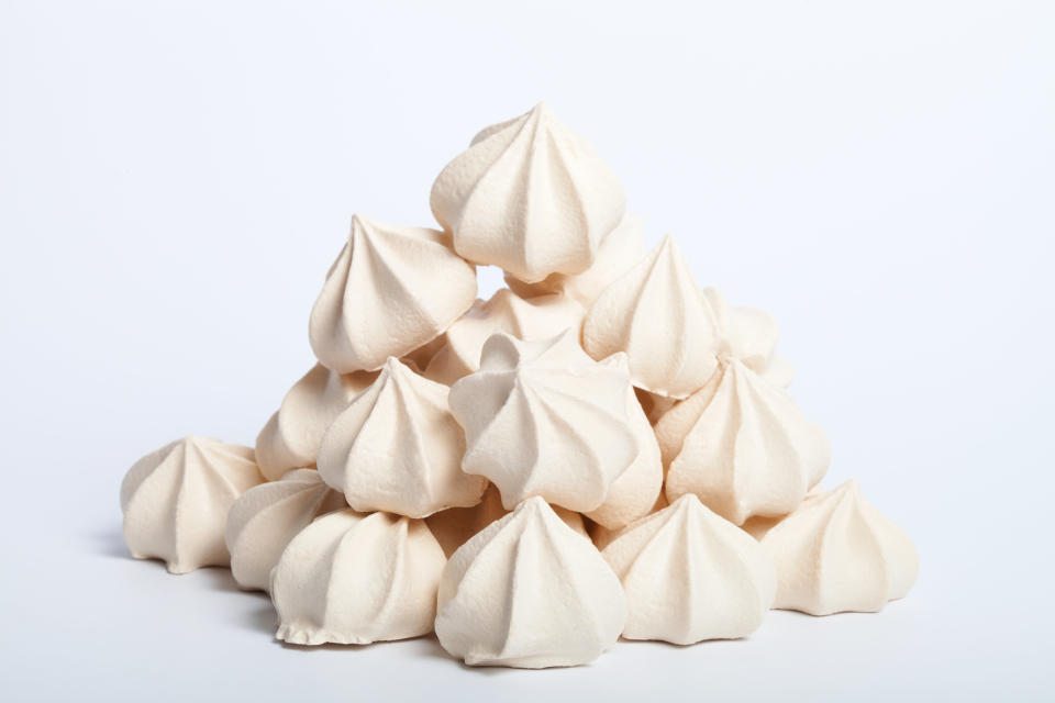 Use a stainless steel or copper bowl. Re-wash and dry your bowl before making meringue even if you think it's clean, then put it in the fridge for a few minutes before starting. The slightest bit of grease from a previous bake or an overly-hot bowl will prevent your meringue from forming stiff peaks. 