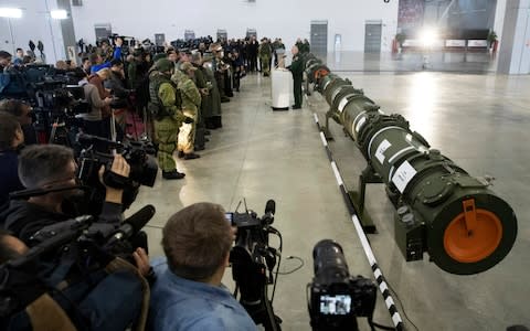 Moscow showed a cruise missile canister to journalists and military attaches in an attempt to argue its 9M279 missile did not violate the INF treaty - Credit: Pavel Golovkin/AP