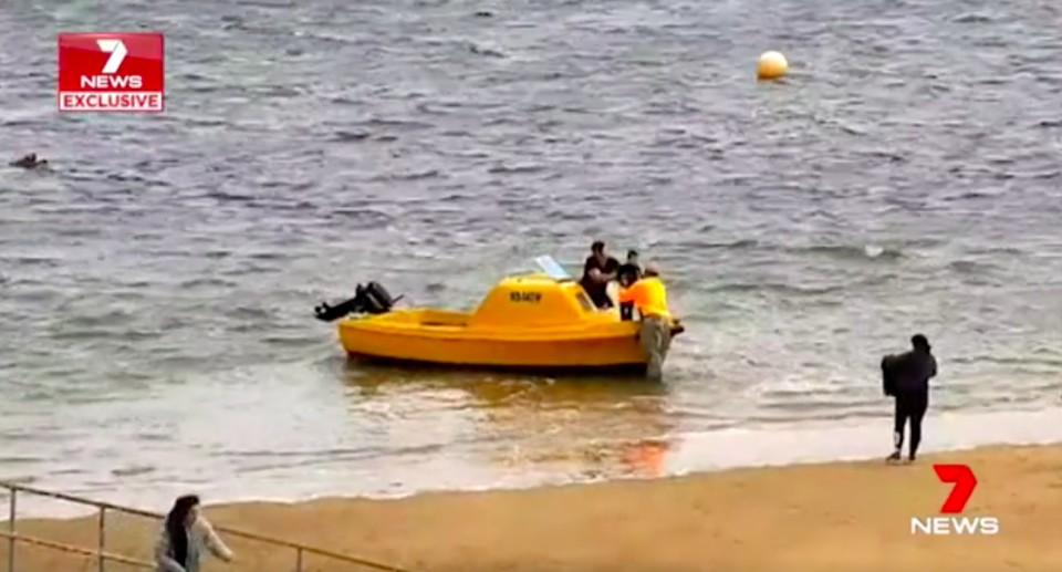 A rental boat sped under the jetty and rescued all three who had ended up in the bay. Source: 7 News