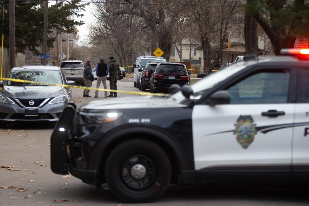 Topeka police mark off an area in the 2000 block of S.W. Lincoln on Thursday morning after a fatal, officer-involved shooting.