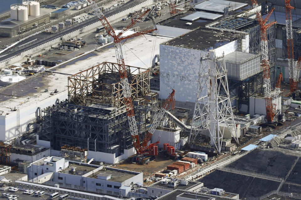 This aerial photo shows the damaged Fukushima Nuclear power plant, sitting in coastal towns of Okuma and Futaba, northeastern Japan, Feb. 11, 2024. (Kyodo News via AP)