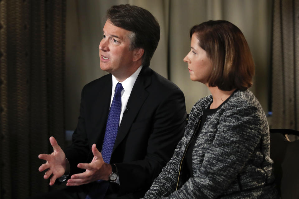 SCOTUS nominee Brett Kavanaugh (with his wife, Ashley Estes Kavanaugh) answered questions during a Fox News interview on Sept. 24, about allegations of sexual misconduct against him. (Photo: AP Photo/Jacquelyn Martin)