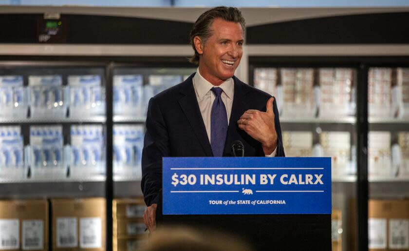 Downey, CA - March 18: Standing infant of refrigerators filled with insulin California Governor Gavin Newsom announces that the state has landed a contract with a company to produce insulin during a press conference at Kaiser Permanente Pharmacy on Saturday, March 18, 2023, in Downey, CA. His plan for a state-run insulin program is part of Newsom's broader agenda to reduce health care costs for Californians. (Francine Orr / Los Angeles Times)