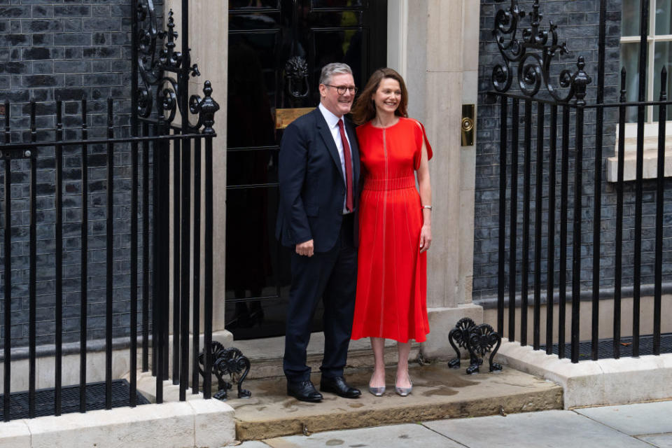 LONDON, ENGLAND - JULY 5: Labour leader and incoming Prime Minister Sir Keir Starmer and wife Victoria, Lady Starmer enter 10 Downing Street following Labour's landslide election victory on July 5, 2024 in London, England. The Labour Party won a landslide victory in the 2024 general election, ending 14 years of Conservative government. (Photo by Carl Court/Getty Images)