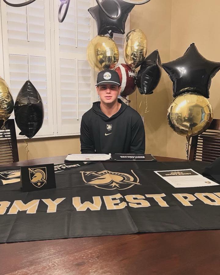 American Heritage-Delray tight end Ryan Vanscoy signs with the Army West Point football program at his home on early signing day on Dec. 20, 2023.