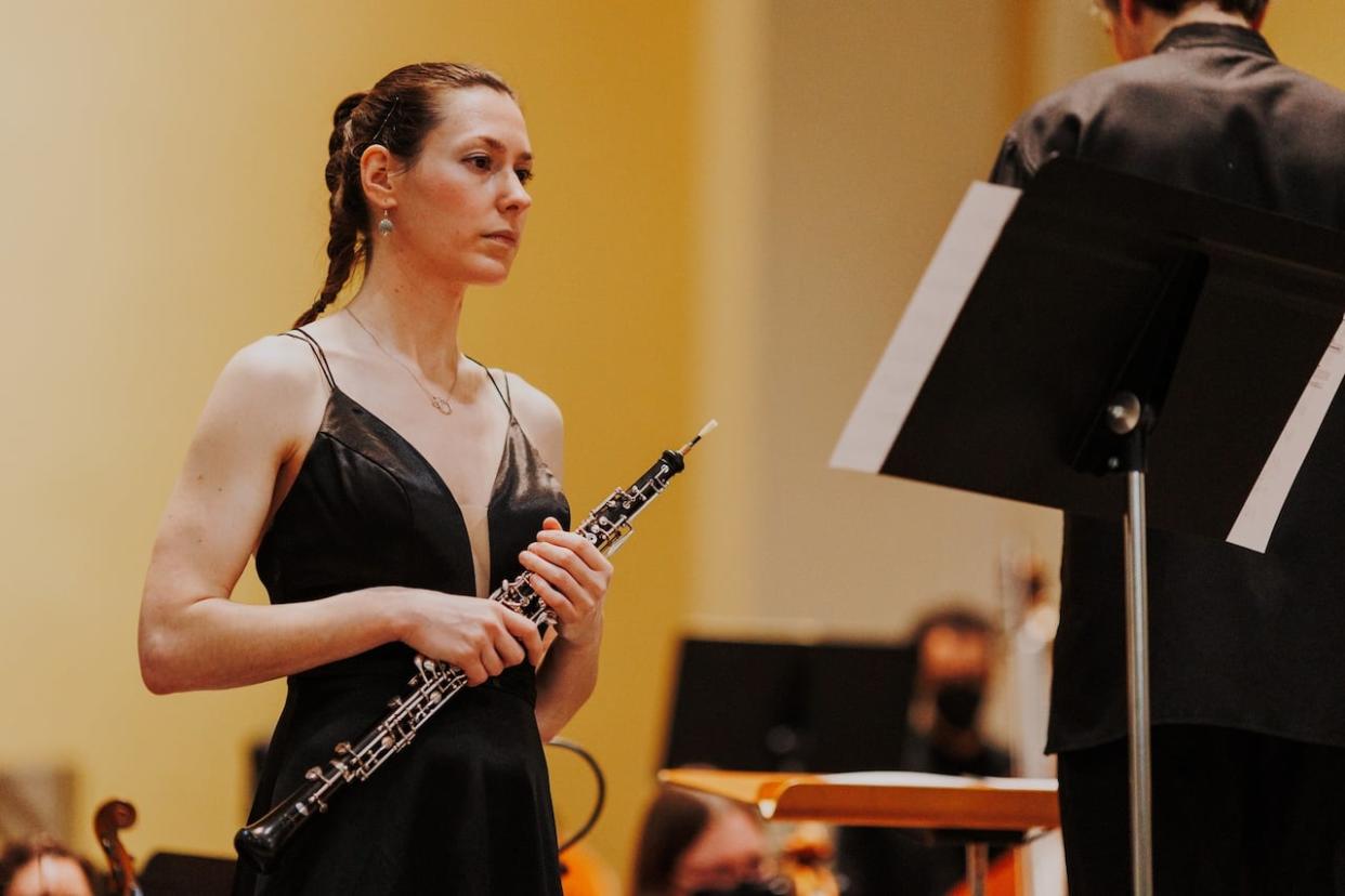 Tamsin Johnston, principal oboist for the Regina Symphony Orchestra, says that while inflation has made times tough for the performing arts, now is also an exciting time to be part of an arts community because it gives people a sense of meaning and connection.  (Chris Graham  - image credit)