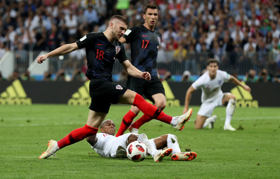 <p>Ashley Young of England tackles Ante Rebic of Croatia during the 2018 FIFA World Cup Russia Semi Final match between England and Croatia at Luzhniki Stadium on July 11, 2018 in Moscow, Russia. (Photo by Clive Rose/Getty Images) </p>