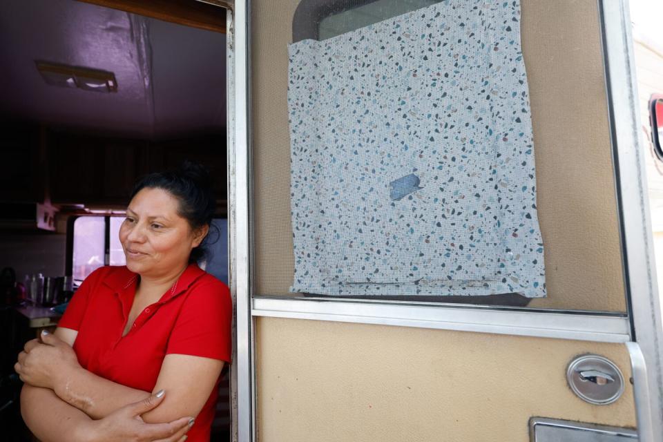 A homeless woman living in a camper with her three kids in San Francisco.