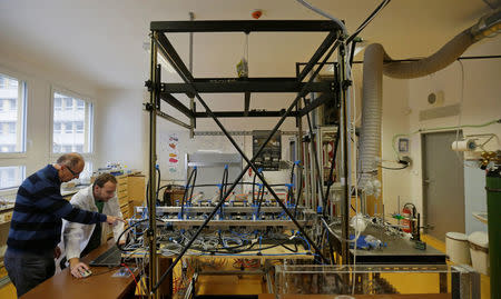 Scientists Miroslav Jicha and Frantisek Lizal operate a model of a functioning human lung that can be used to simulate chronic diseases and their treatments in the Brno University of Technology in Brno, Czech Republic, November 22, 2016. Picture taken November 22, 2016. REUTERS/David W Cerny