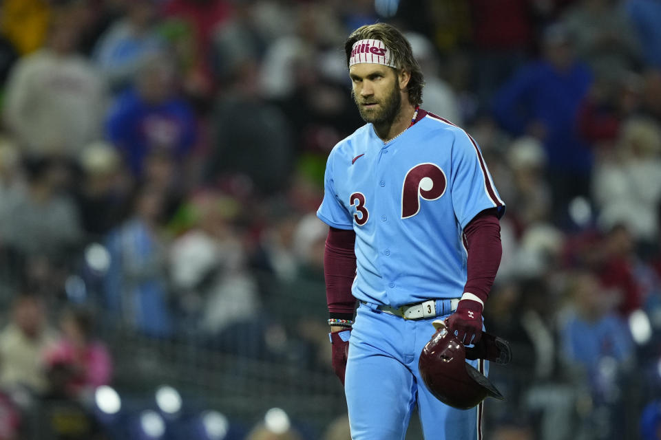 Philadelphia Phillies' Bryce Harper walks off the field after being ejected in the third inning of a baseball game against the Pittsburgh Pirates, Thursday, Sept. 28, 2023, in Philadelphia. (AP Photo/Matt Rourke)