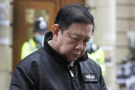 Kyaw Zwar Minn, the Myanmar's ambassador in London stands outside the Myanmar Embassy whilst a statement is read on his behalf in London, Thursday, April 8, 2021. Newspaper reports say the embassy was taken over by members of the country's new military regime Wednesday evening. (AP Photo/Kirsty Wigglesworth)