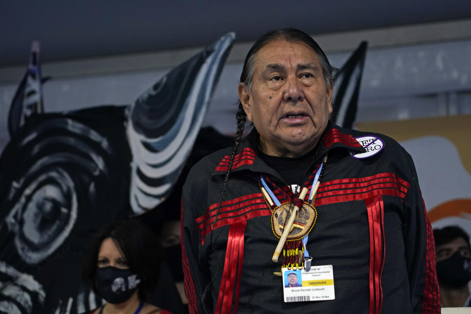 Bruce Kendall Goldtooth, environmental, climate, and economic justice activist, speaks as he attends a protest inside the venue of the COP26 U.N. Climate Summit in Glasgow, Scotland, Tuesday, Nov. 9, 2021. The U.N. climate summit in Glasgow has entered it's second week as leaders from around the world, are gathering in Scotland's biggest city, to lay out their vision for addressing the common challenge of global warming. (AP Photo/Alberto Pezzali)