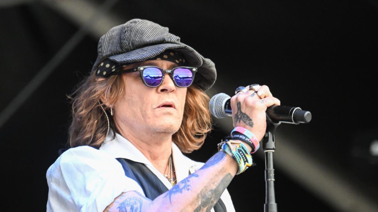 Mandatory Credit: Photo by KIMMO BRANDT/EPA-EFE/Shutterstock (12992283p) Johnny Depp performs on stage at the Helsinki Blues Festival, Finland, 19 June 2022. Johnny Depp and Jeff Beck in Helsinki Blues Festival, Finland - 16 Jun 2022