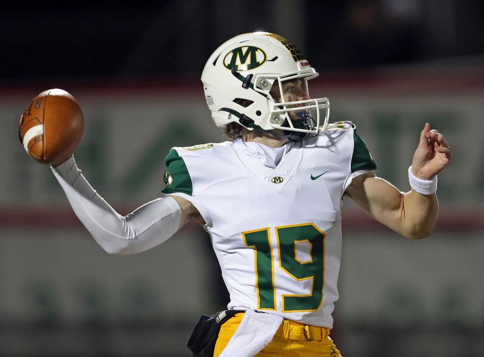 Medina quarterback Danny Stoddard looks to throw against Wadsworth during the first half of a Division I regional quarterfinal football game, Friday, Nov. 3, 2023, in Wadsworth, Ohio.