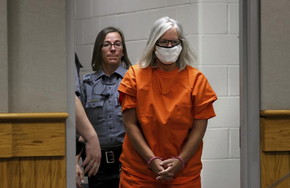 Pamela Hupp is escorted into the courtroom for a hearing at the Lincoln County Justice Center, Tuesday, July 27, 2021, in Troy, Mo. Hupp, already serving a life sentence for murder, pleaded not guilty Tuesday in the stabbing death of her friend a decade ago. Hupp is charged with first-degree murder and armed criminal action in the death of Elizabeth “Betsy” Faria, in 2011. (Christian Gooden/St. Louis Post-Dispatch via AP)