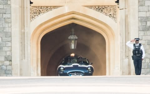 The Duke and Duchess leaving Windsor Castle in the E-type - Credit: Noam Galai
