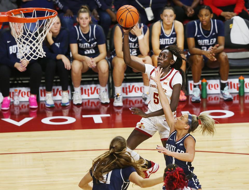 Iowa State forward Nyamer Diew shoots around Butler guard Karsyn Norman during the second quarter at Hilton Coliseum on Monday.