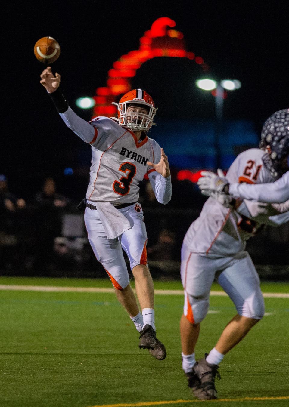 Byron QB Braden Smith throws a pass to Ethan Palzkill, not pictured, during the fourth quarter in Elmhurst on Saturday, Nov. 20, 2021. Byron beat IC Catholic 15-14 to advance to the Class 3A state title game.