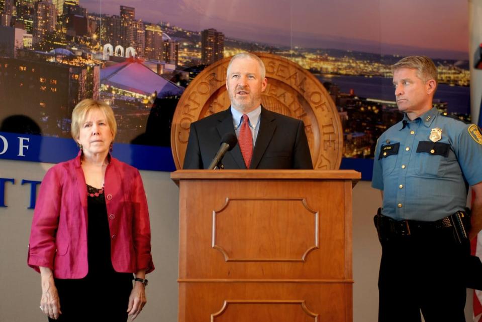 <div class="inline-image__caption"><p>Then-Seattle Mayor Mike McGinn, center, was among the Washington officials who condemned Backpage in 2012.</p></div> <div class="inline-image__credit">Mayor McGinn/Wikimedia Commons</div>